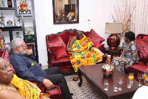 Otumfuo Osei Tutu II with the Rawlings'