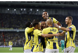 Alexander Djiku shares a moment with teammates after securing a 2-0 win against Bodrumspor