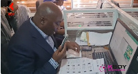 Dr Mahamudu Bawumia, Vice president on phone with some of the delegates