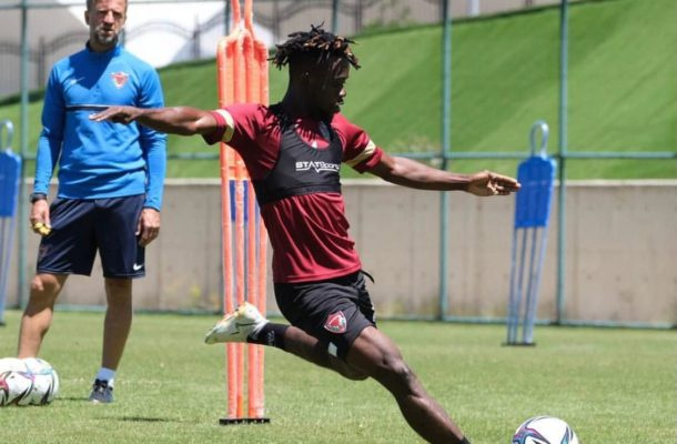 Joseph Akomadi in training with his club side