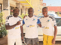 Kweku Obeng Myxtro, Odi Asempa and Kofi Aduonum in their Ice Gold shirt in Cameroon