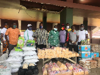 Lawrence Nyanyo Nmai presenting food items to the Ghana Boxing Federation