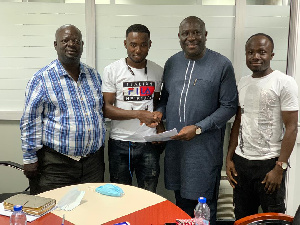 Isaac Agyenim Boateng With Hearts Of Oak Officials 