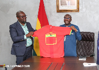 Vice President Dr. Mahamudu Bawumia holding the new Black Stars jersey