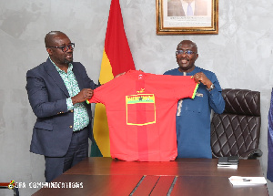 Vice President Dr. Mahamudu Bawumia holding the new Black Stars jersey