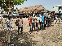 Some passengers waiting to be screened