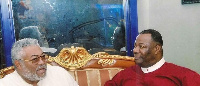 Archbishop Nicholas Duncan-Williams (R) in a hearty chat with the late Jerry John Rawlings (L)