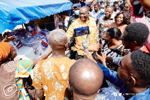 Some of the sympathisers are seen here mobbing the minister during his visit