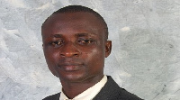 Mr.  Paul Essien, MP for Jomoro constituency