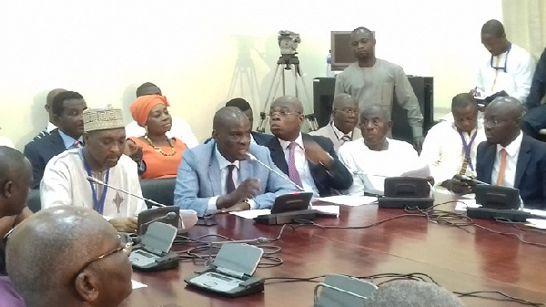 Minority leader Haruna Iddrisu and a section of the minority at the press conference