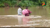 The bridge on the River Bisi has been submerged affecting the movement of the residents.