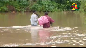 The bridge on the River Bisi has been submerged affecting the movement of the residents.