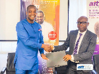 Caption (from left) Dr Yeboah-Afari and Prof. Asare-Bediako exchanging the MoU