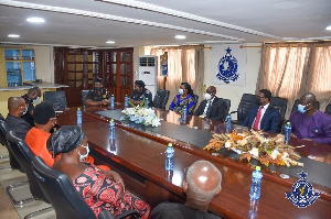 Bankers and family of late cop at the police headquarters