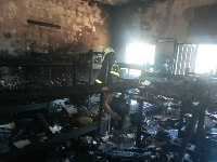 A photo of the dormitory block gutted by fire