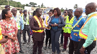 Minister of Transport Kweku Ofori Asiamah in brown