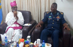 Most Rev. Palmer Buckle interacting with Air Marshall Samson Oje at his office