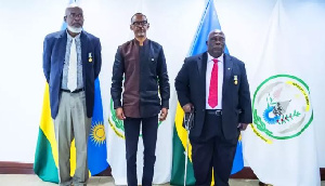 President Paul Kagame shares a photo with the two generals - Adinkra and Anyidoho