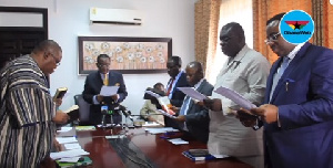 Minister of Agriculture, Dr Owusu Akoto Afriyie swearing in seven member board