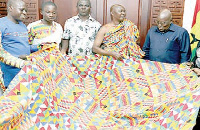 President Akufo-Addo being presented with the new Kente