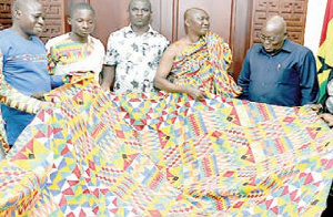 President Akufo-Addo being presented with the new Kente