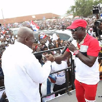 Amakye Dede in a handshake with Nana Addo