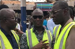 Hassan Tampuli and other officials during the Trinity Gas Station shutdown