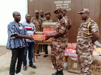 Dr. Kingsley Preko presenting the donation to the prison authorities