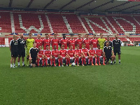 Christian Frimpong in a group picture with Swindon FC