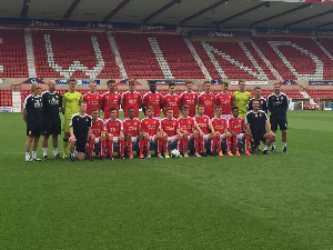 Christian Frimpong in a group picture with Swindon FC