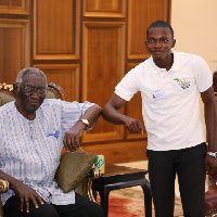 Daniel Amoshie and former President Kufuor