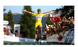 Tadej Pogačar celebrates winning stage 20 of this year's Tour de France.