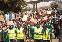 Personnel from the Ghana Police Service leading the unemployed nurses during