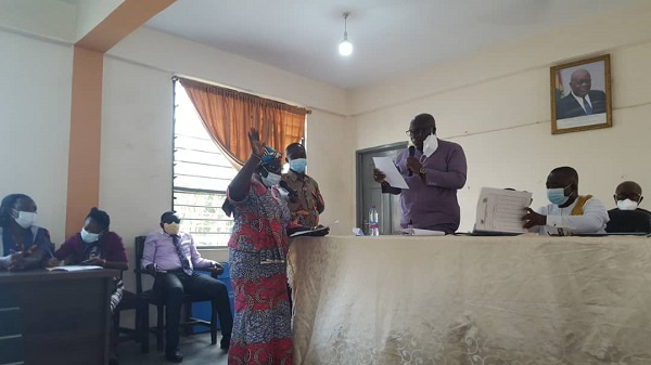 Madam Comfort Asante being sworn into office by the Regional Minister