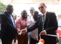 Le Goff (R), Ebenezer Faulkner (L) at the opening of Westlands Shell service station