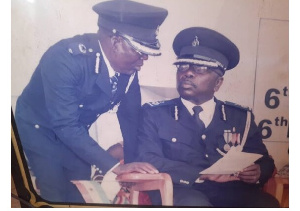 DCOP Ayensu Opare Addo (seated)