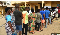 People queued at a polling station in the ongoing registration exercise. File photo