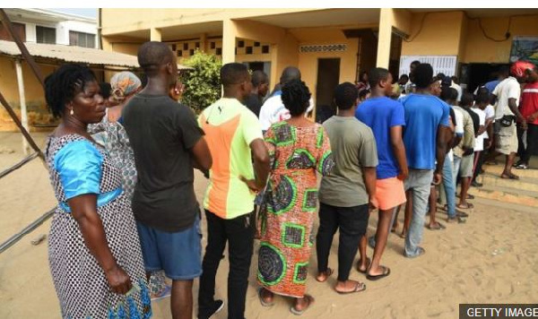 People queued at a polling station in the ongoing registration exercise. File photo