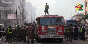 GNFS officials at the scene of the Makola fire incident