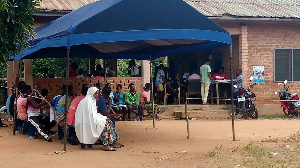 Photo of some would be voters waiting in queue to be registered.