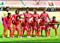 Asante Kotoko players pose for a pre-match team photo