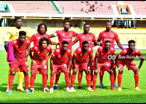 Asante Kotoko players pose for a pre-match team photo