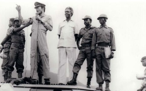 Ex-President Jerry John Rawlings (on the microphone) led the AFRC military junta