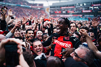 Jeremie Frimpong was carried by the Leverkusen fans and celebrated