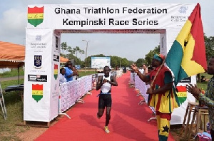 Ghanaian triathlete winning a race