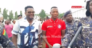 Asamoah Gyan (left) with John Paintsil