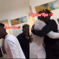 Shatta Wale and Mr Eazi share a hug