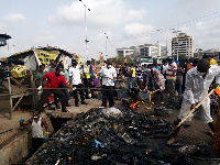 Residents of Korle Klottey Municipal Assembly during the clean-up exercise at Tema station