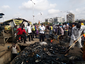 Residents of Korle Klottey Municipal Assembly during the clean-up exercise at Tema station