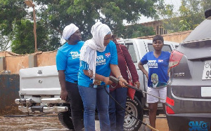 Dr. Bawumia's wife, Samira Bawumia joined other NPP loyal ladies to distribute party stickers.